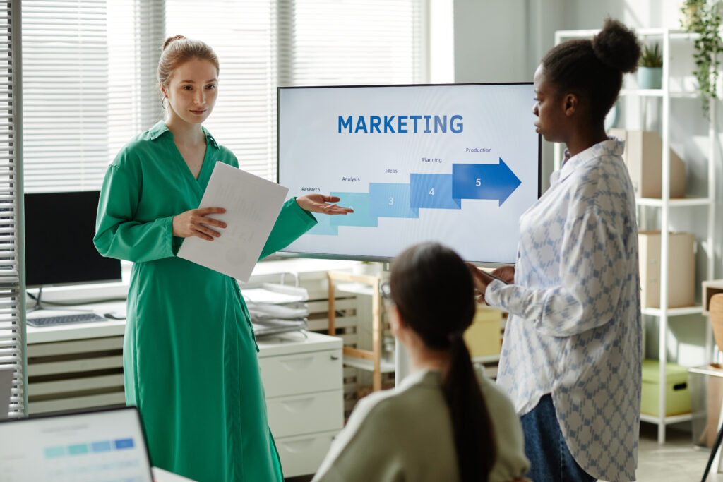 Woman giving business presentation for colleagues